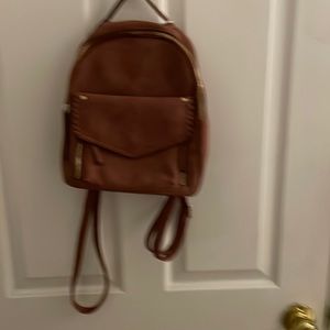 Smaller backpack purse, suede blush color- brand new never used